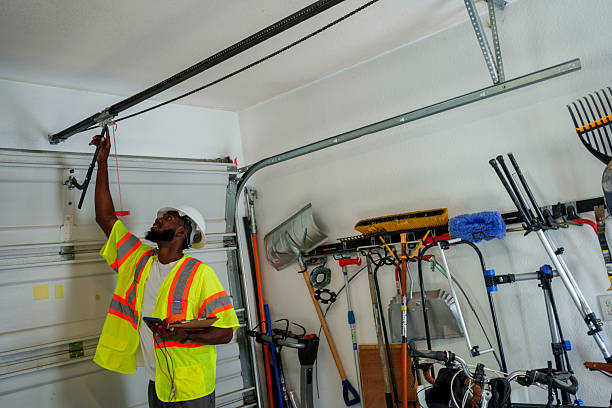 Professional Garage Door Panel Replacement technician working in Central City, PA